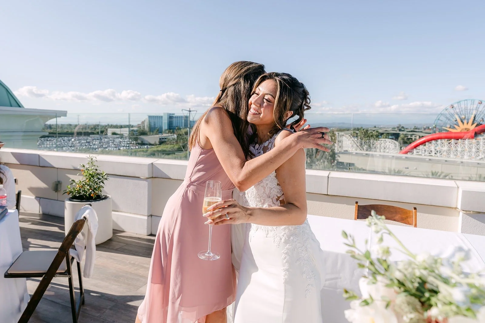 Francesca hugs a guest on the Jewel Terrace