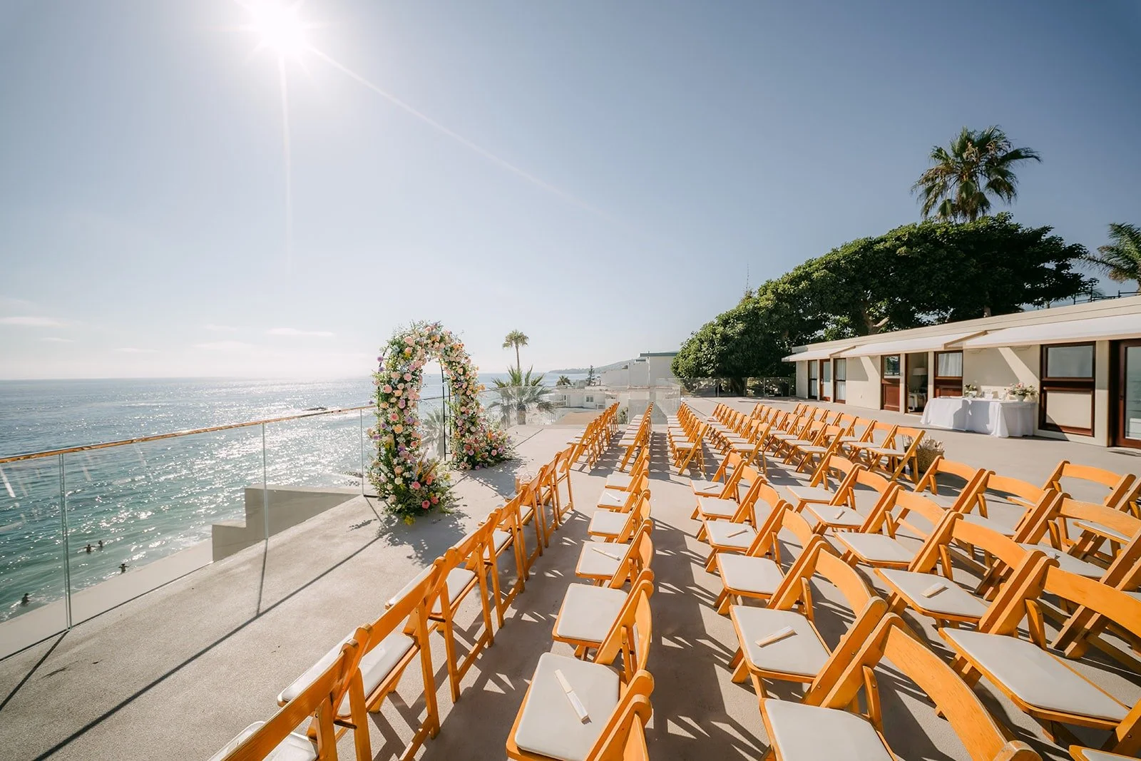 A wide view of the ceremony terrace above the beach in Laguna Beach