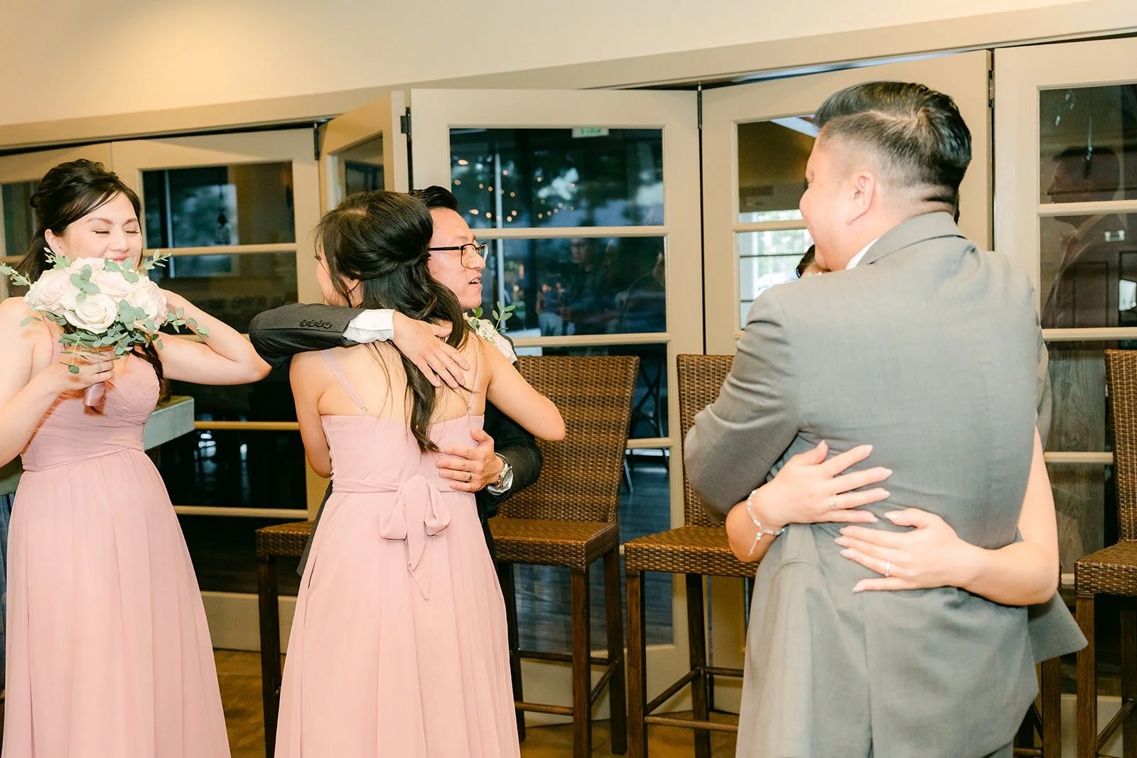 The wedding party celebrating, photographed by One and Only Production