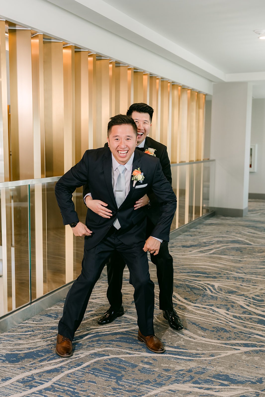 San and his groomsmen goofing around for a fun portrait.