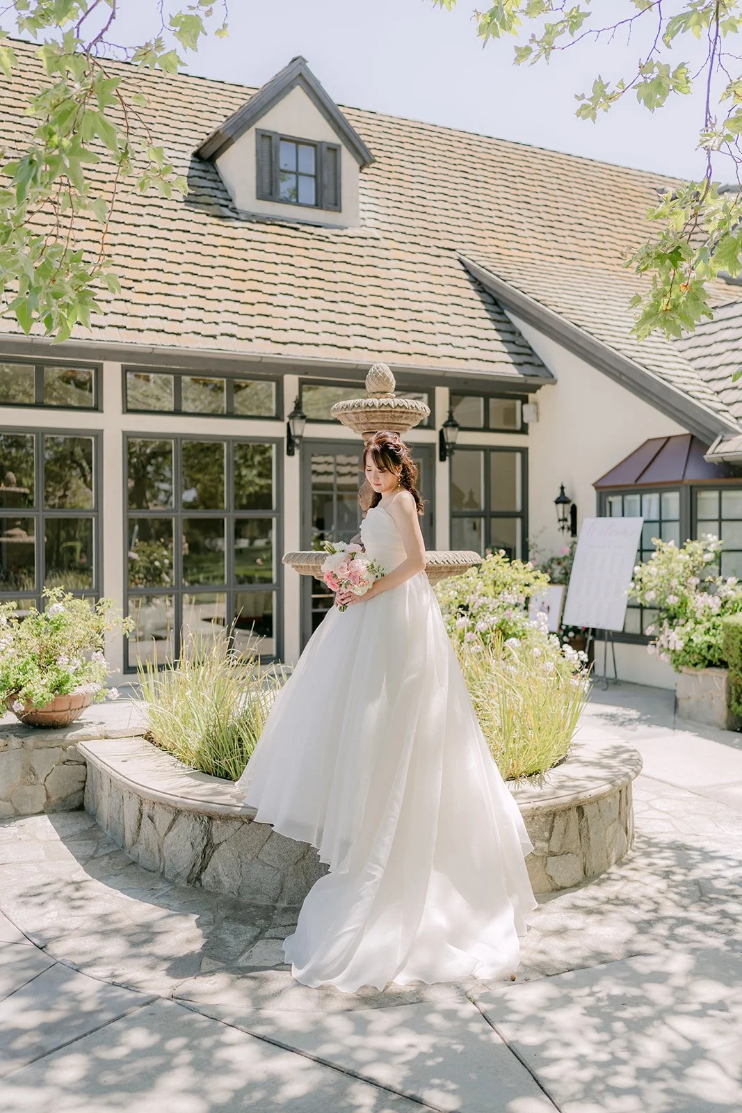 Judy in front of the English manor at Summit House