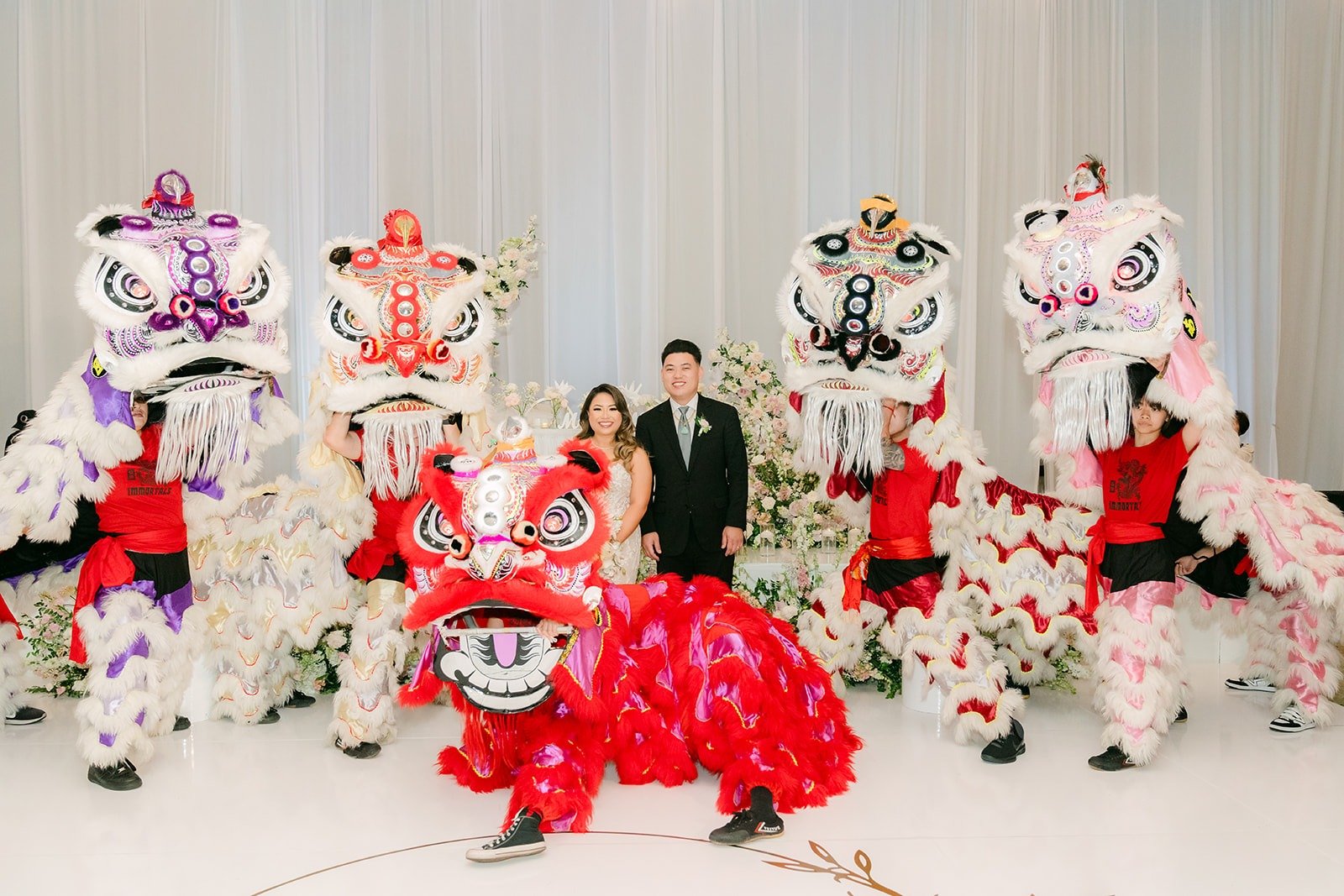 Lion dancers lined up for Candice and Vincent's grand entrance