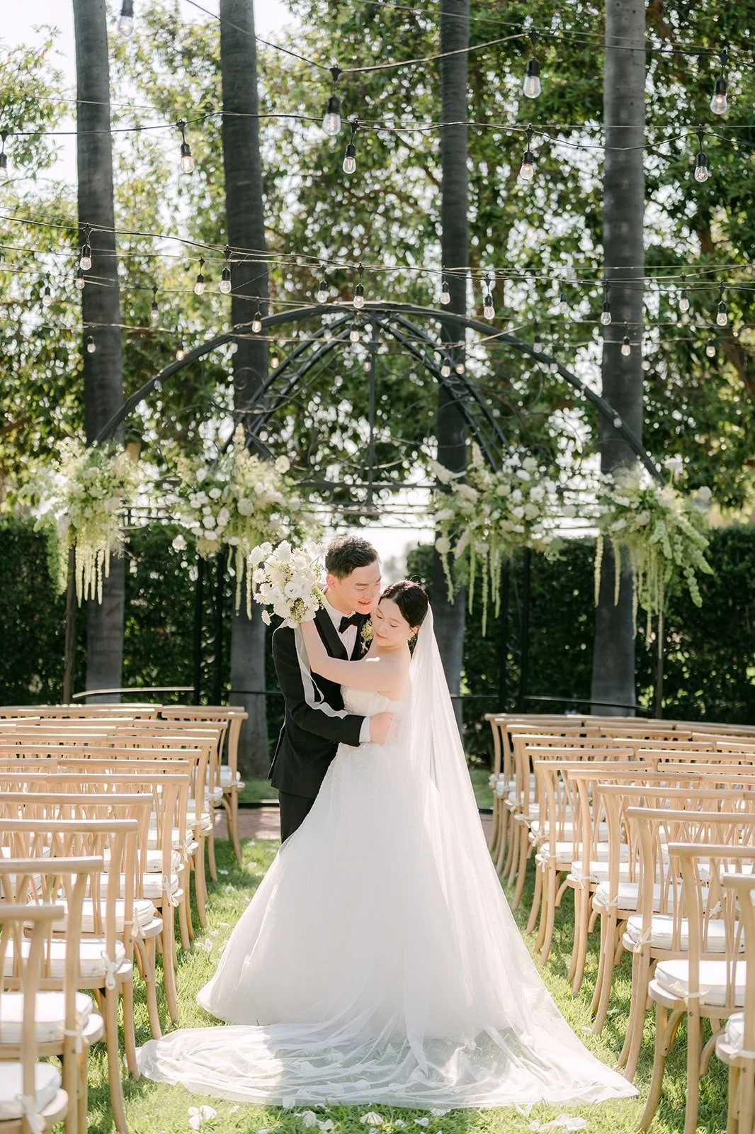 Sam dipping Amy in the aisle of the Italian Garden