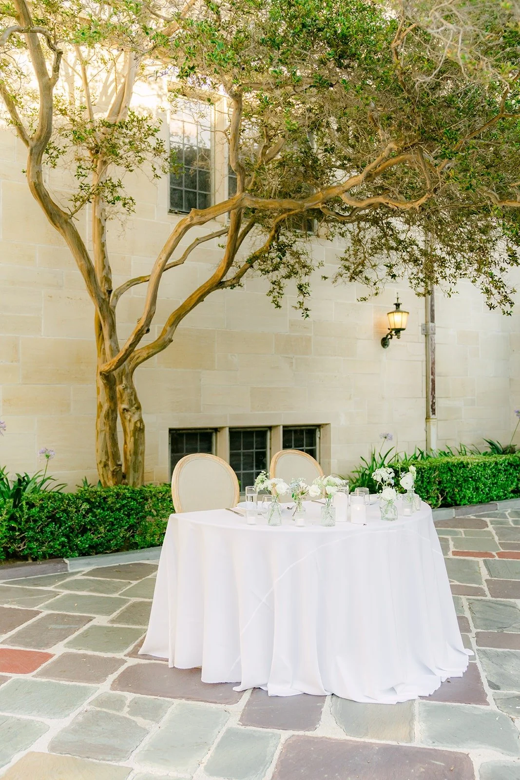 A reception table under the courtyard tree