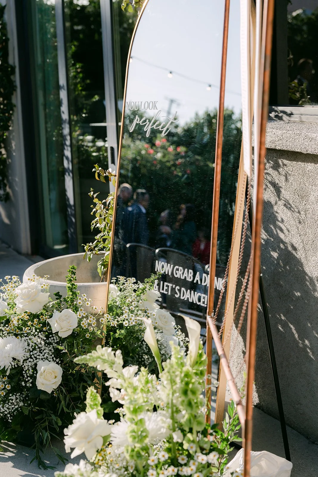 Ceremony arch detail with white florals
