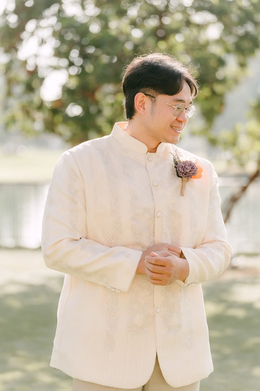 Jacob in his barong and orange boutonniere