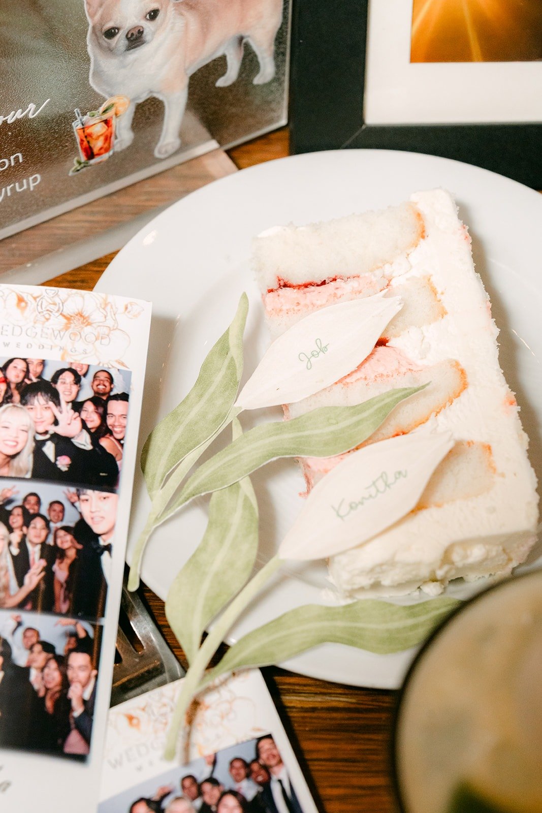 Photo strips beside a place setting with dried florals
