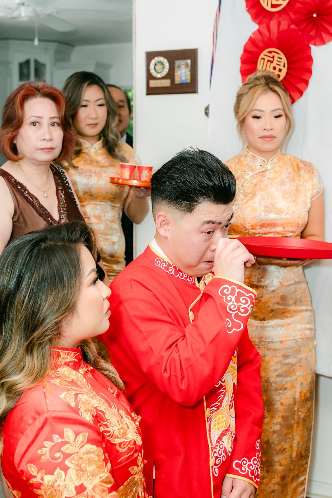 Vincent taking on a drinking challenge from the bridesmaids