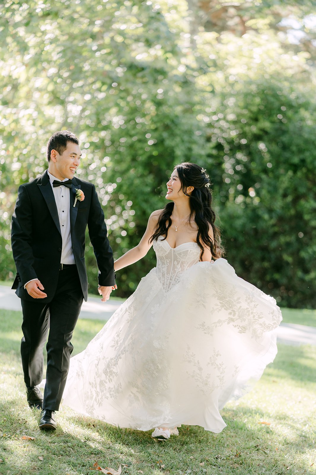 Clarissa and Austin walking in the sunlight