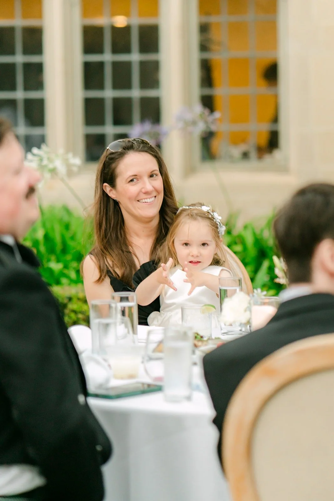 A guest smiling during the speeches