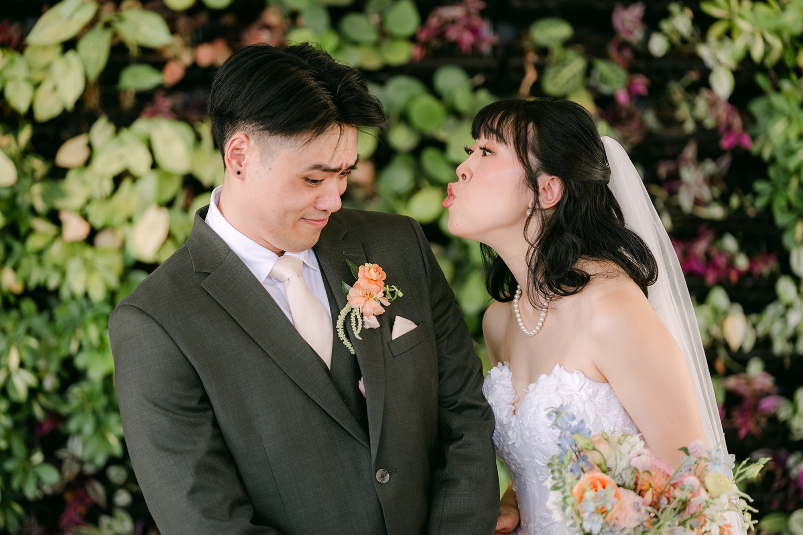 Vivian kissing Alex on the cheek, photographed by One and Only Production