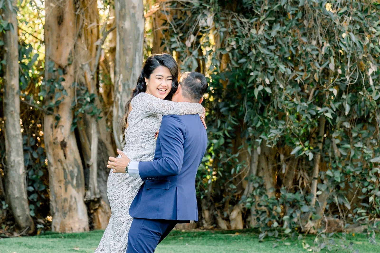 Hannah and Vincent sharing a hug in the garden