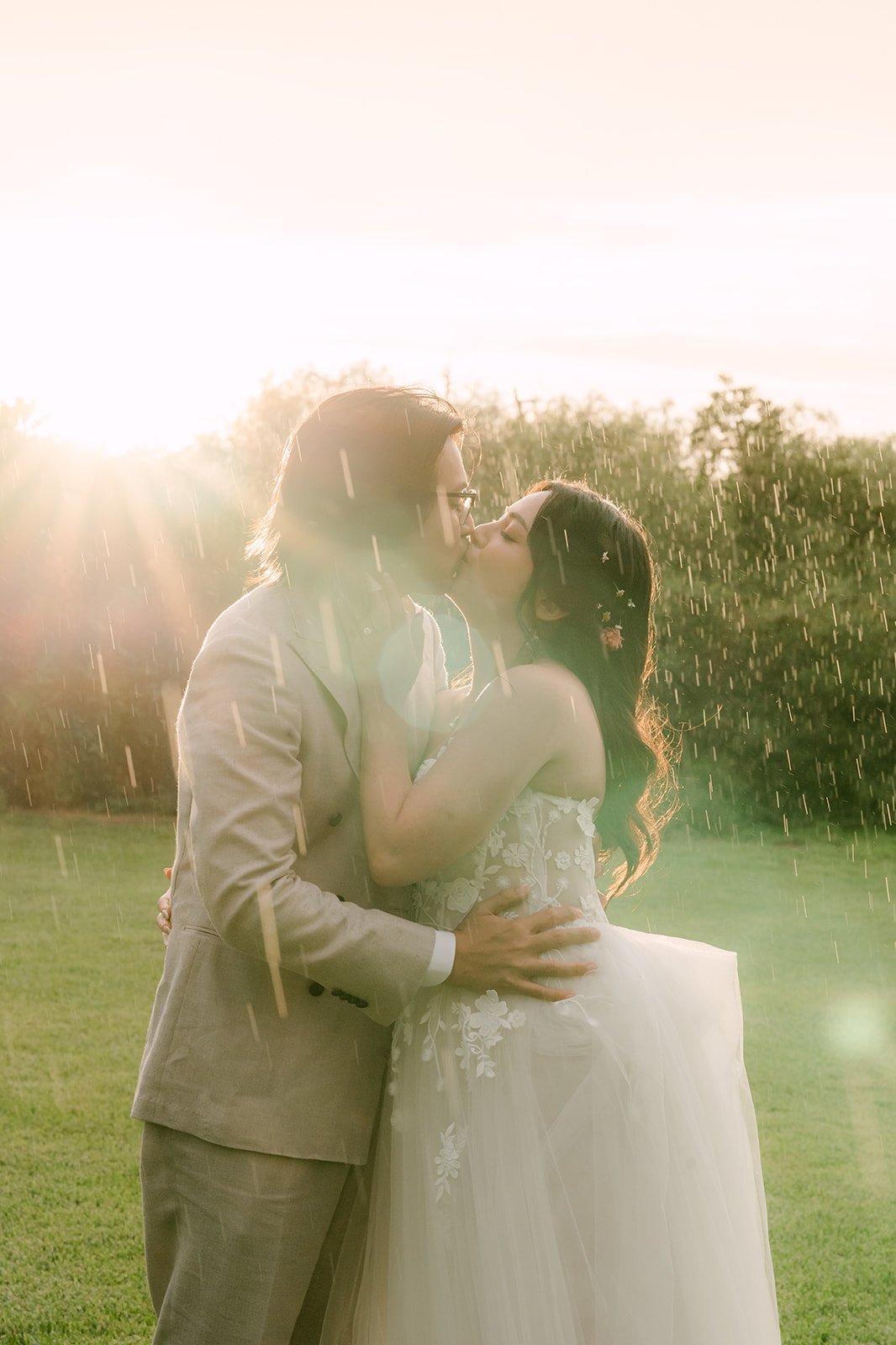 Couple embracing in the warm sunset glow