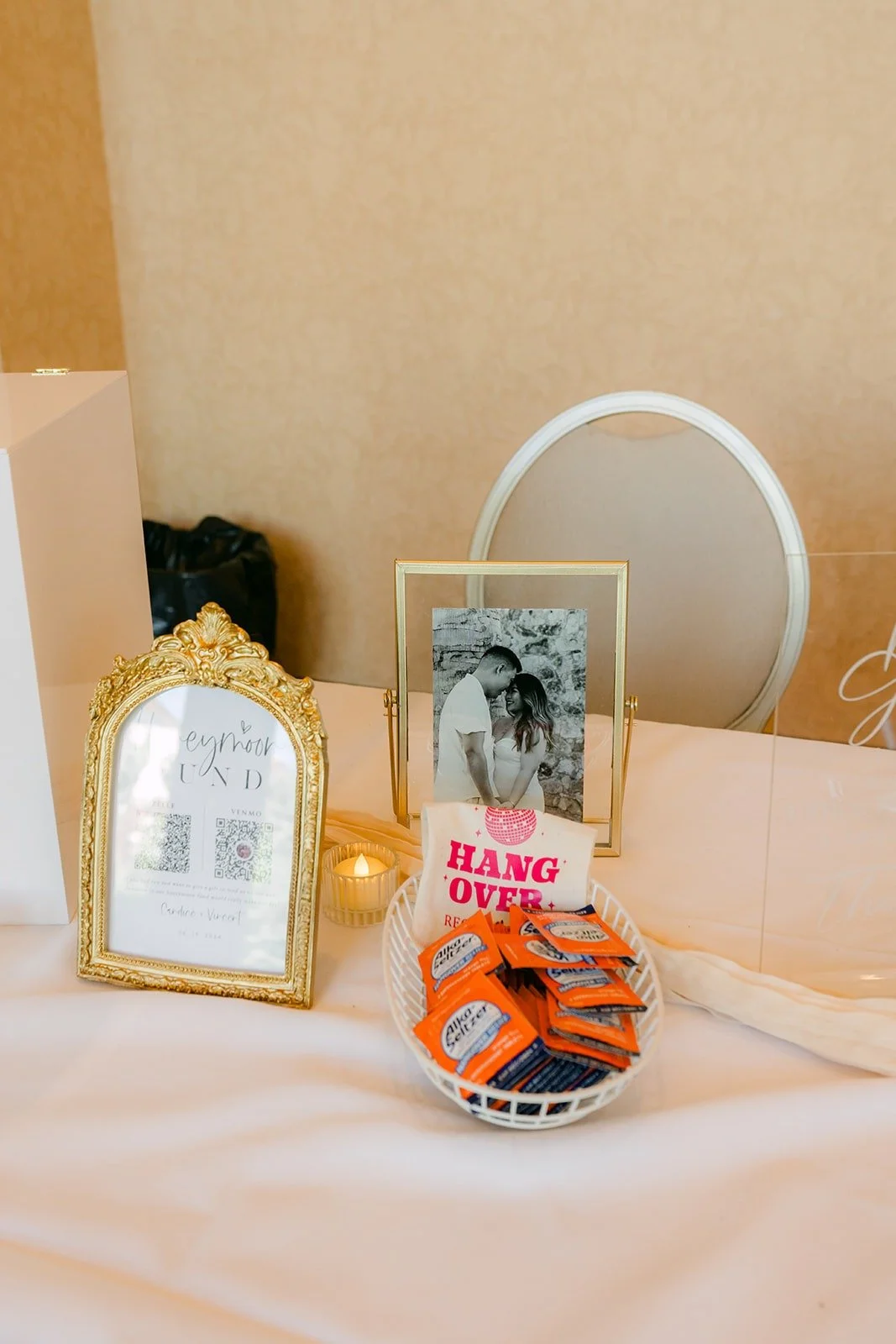 Framed photos and keepsakes on the memory table