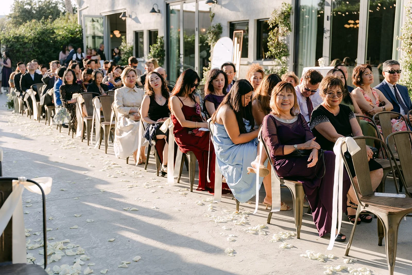 Guests seated for the outdoor ceremony at The Harper