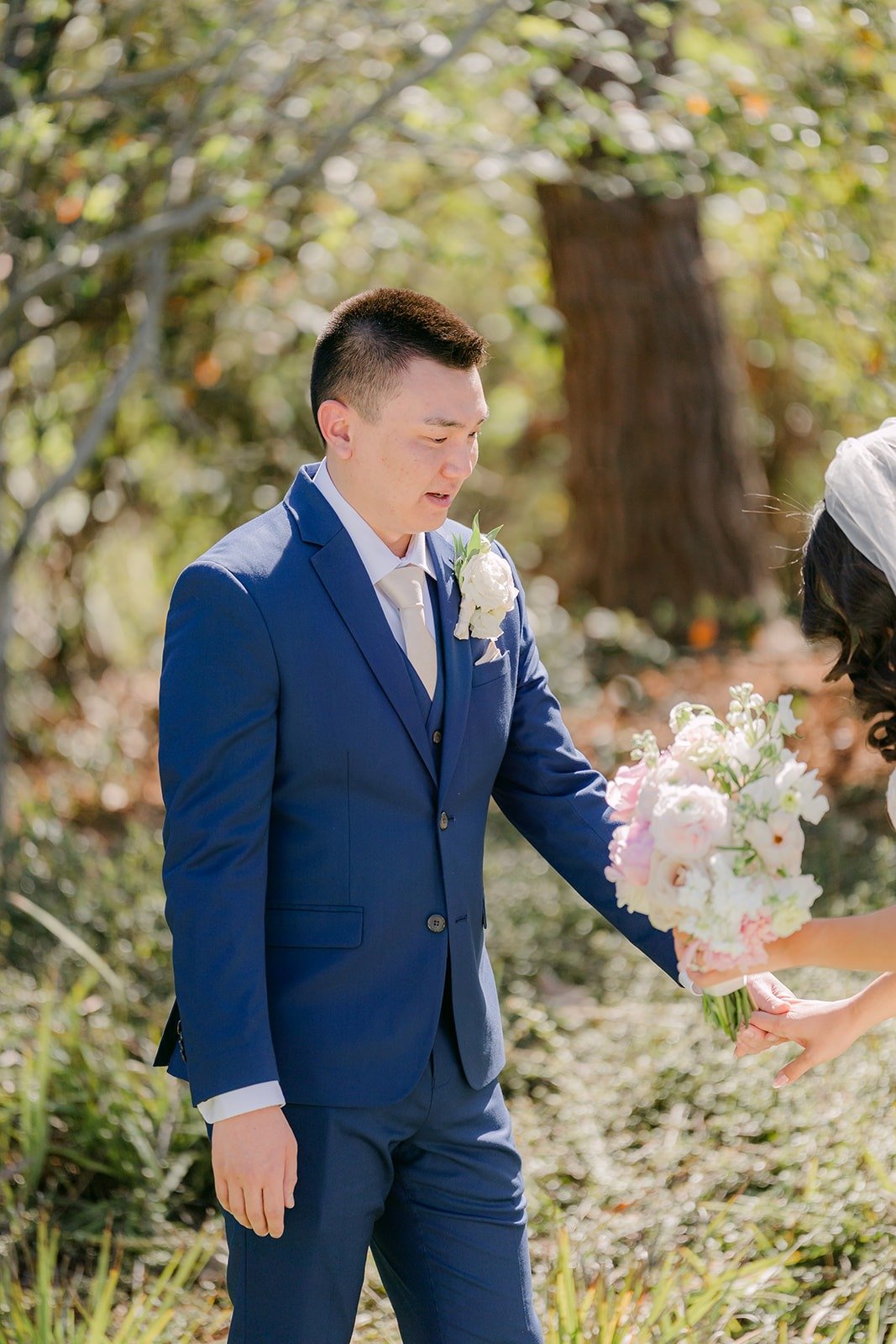Alex smiling as he sees Kelli in her gown for the first time