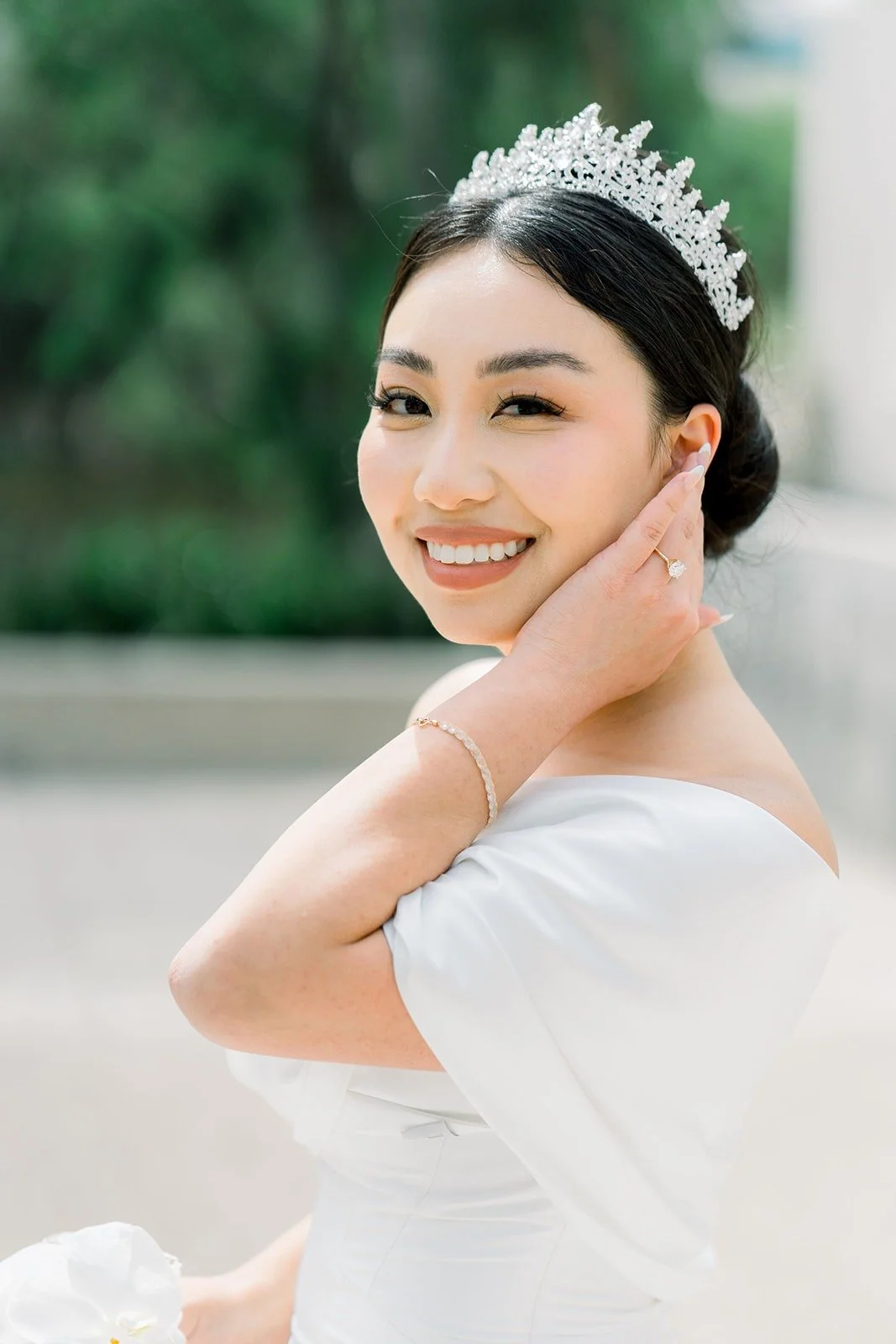 Jacinda smiles in her crystal tiara