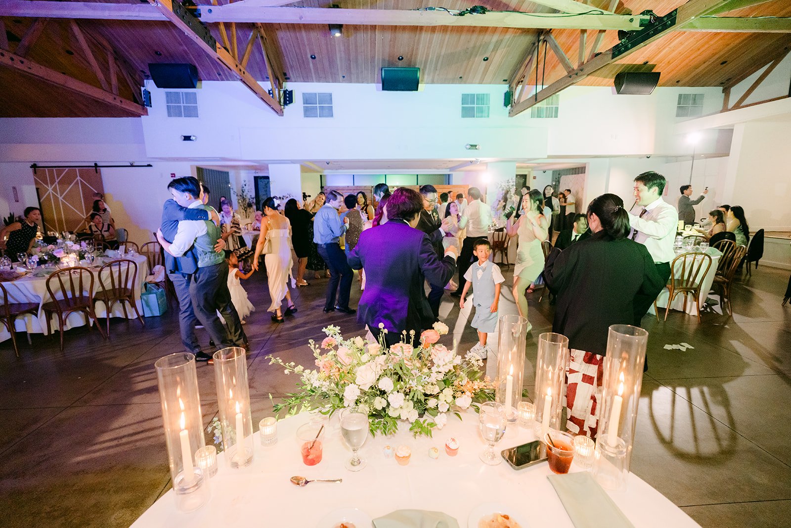 Guests gathered on the dance floor in the Colony House Great Hall
