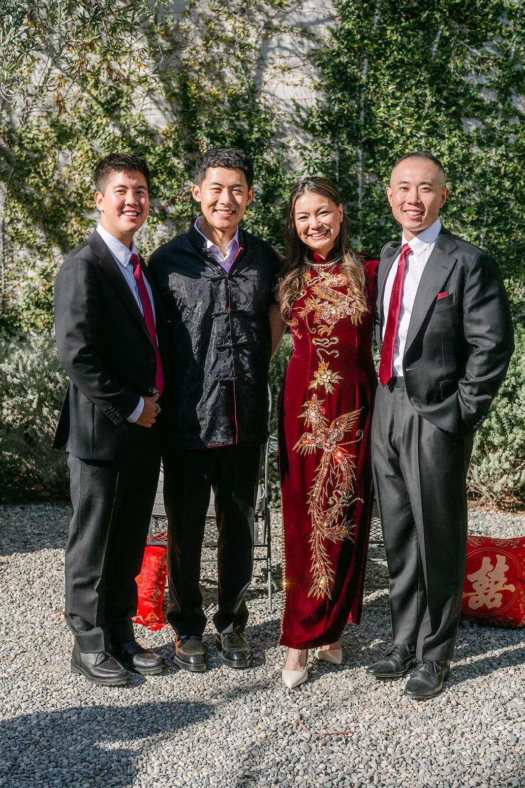 Jadee and Richard with family in the garden after the tea ceremony