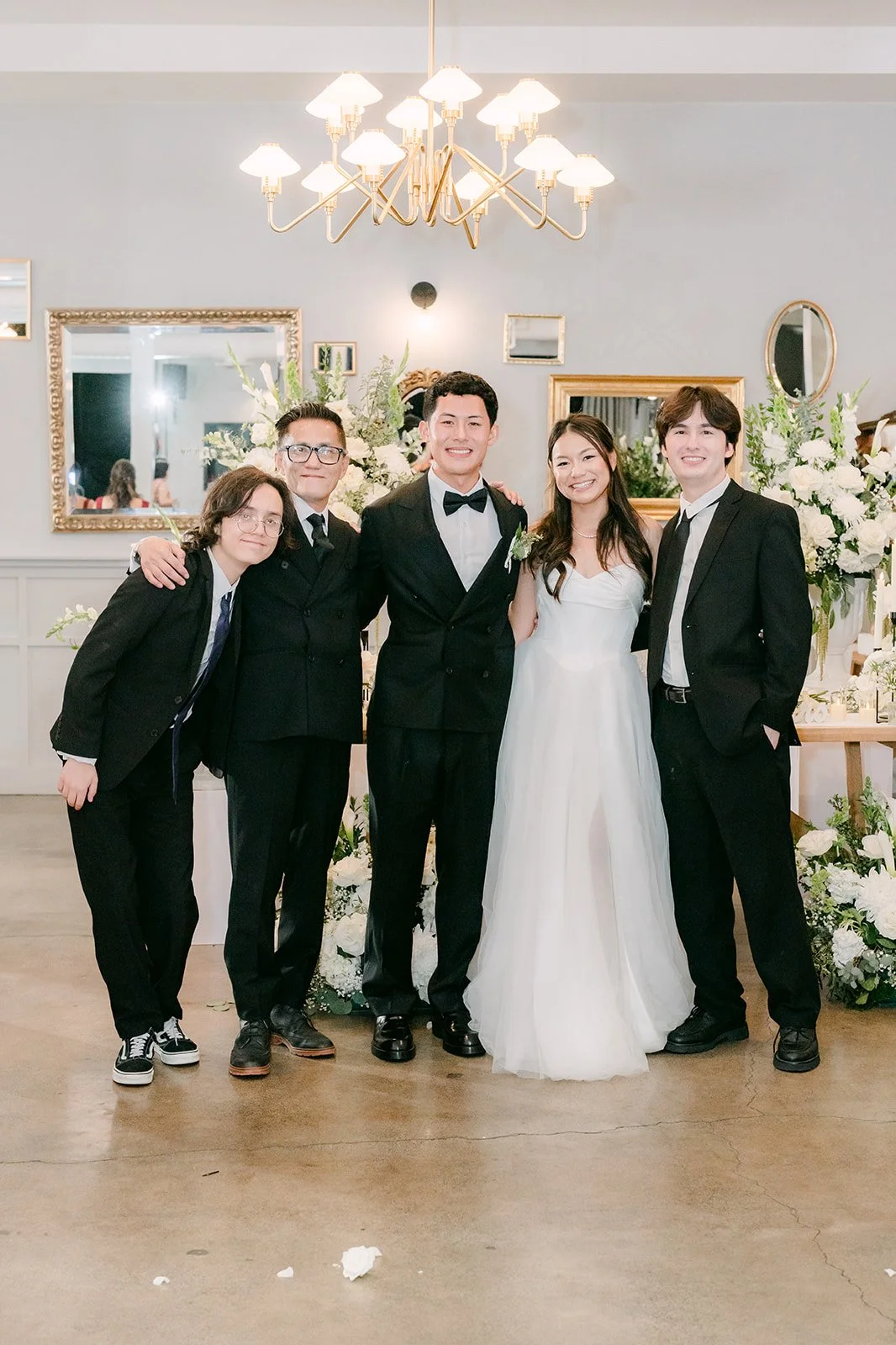 Jadee and Richard with friends in the reception room