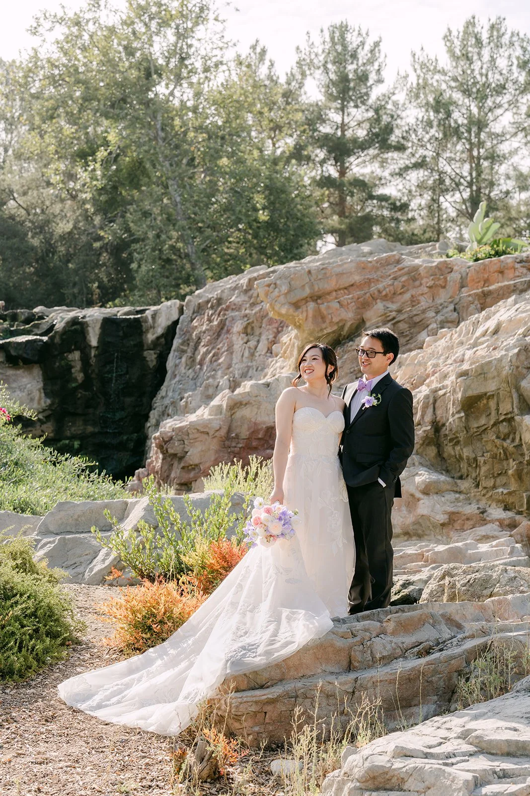 Mary and Patrick on the rocks by the waterfall at Dove Canyon