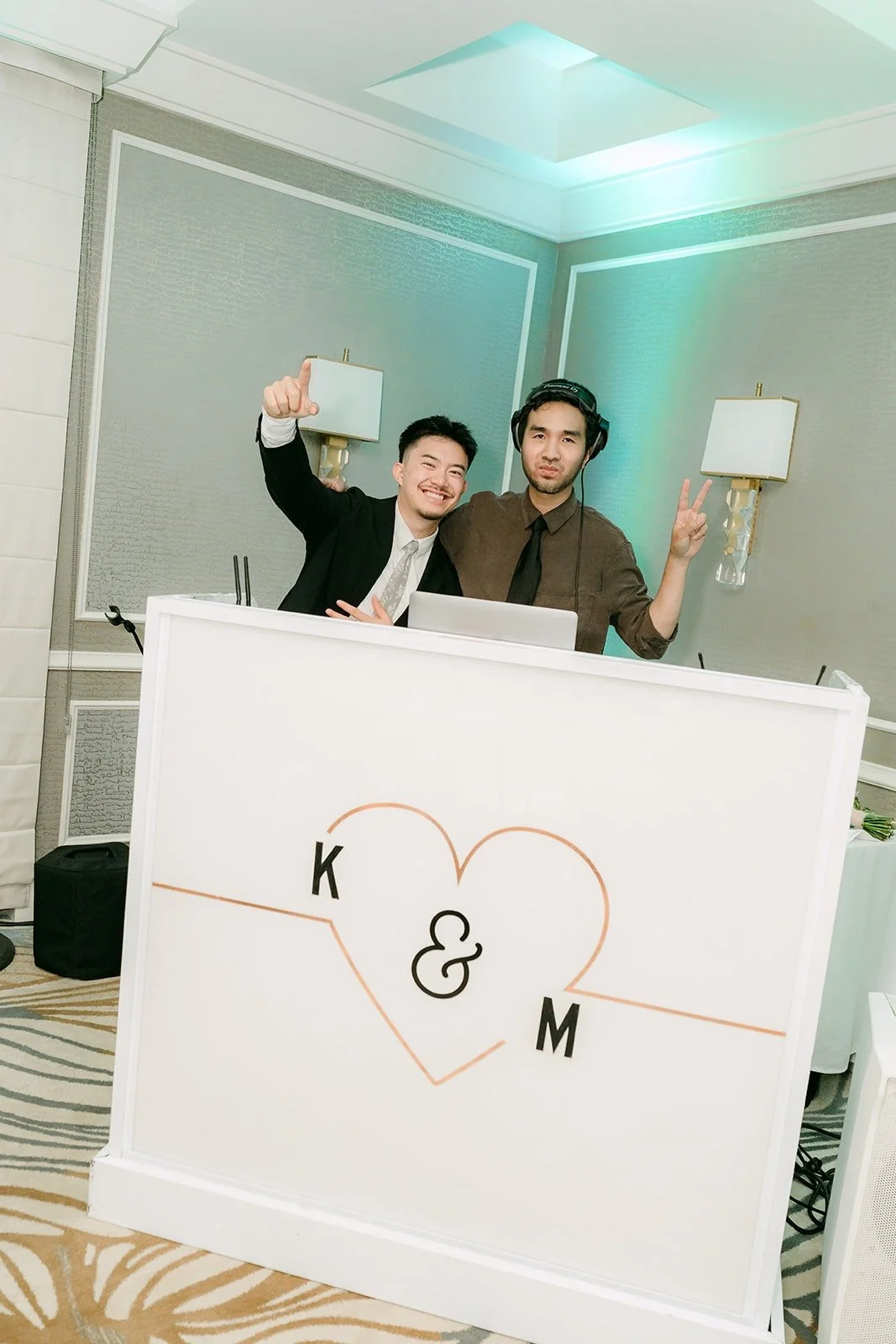 The DJ booth with a Kylie and Mario monogram