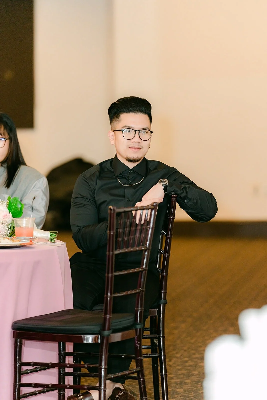 A guest laughing during the reception