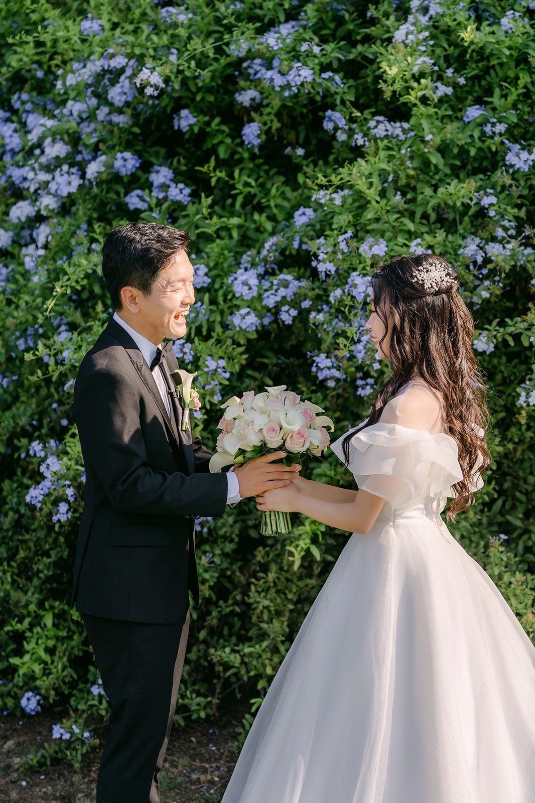 Eunsang taking in Jeannie and her bouquet
