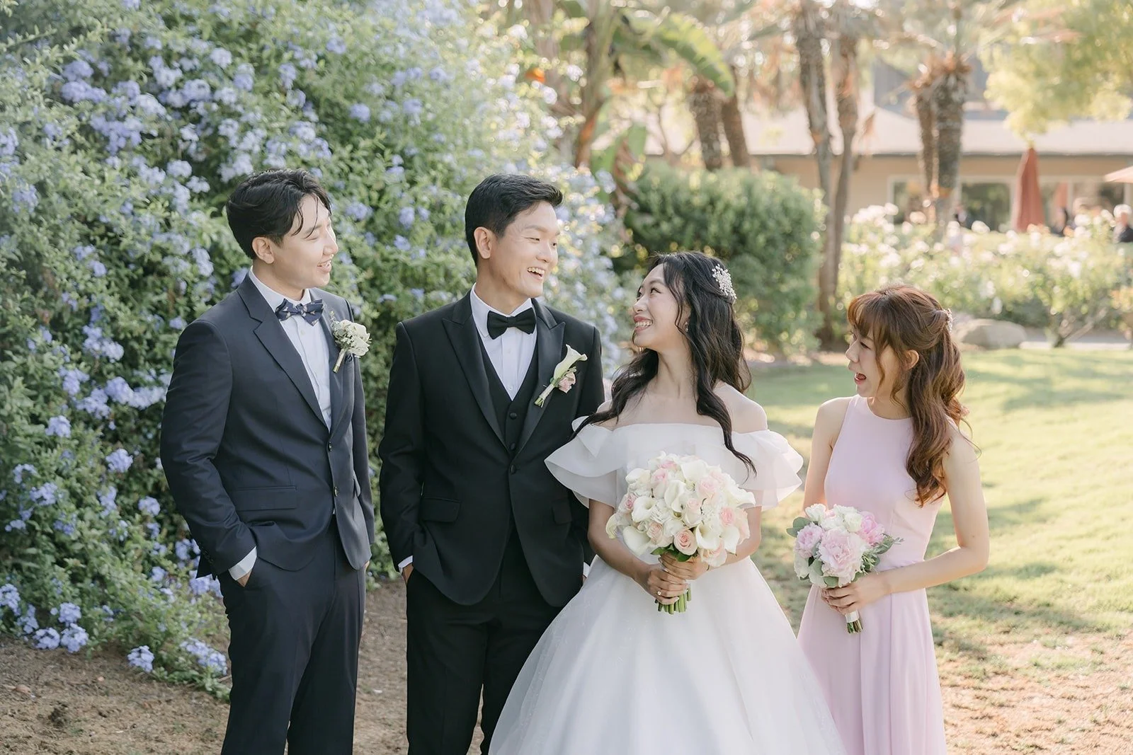 Jeannie and Eunsang with Stephanie and Andrew under the trees