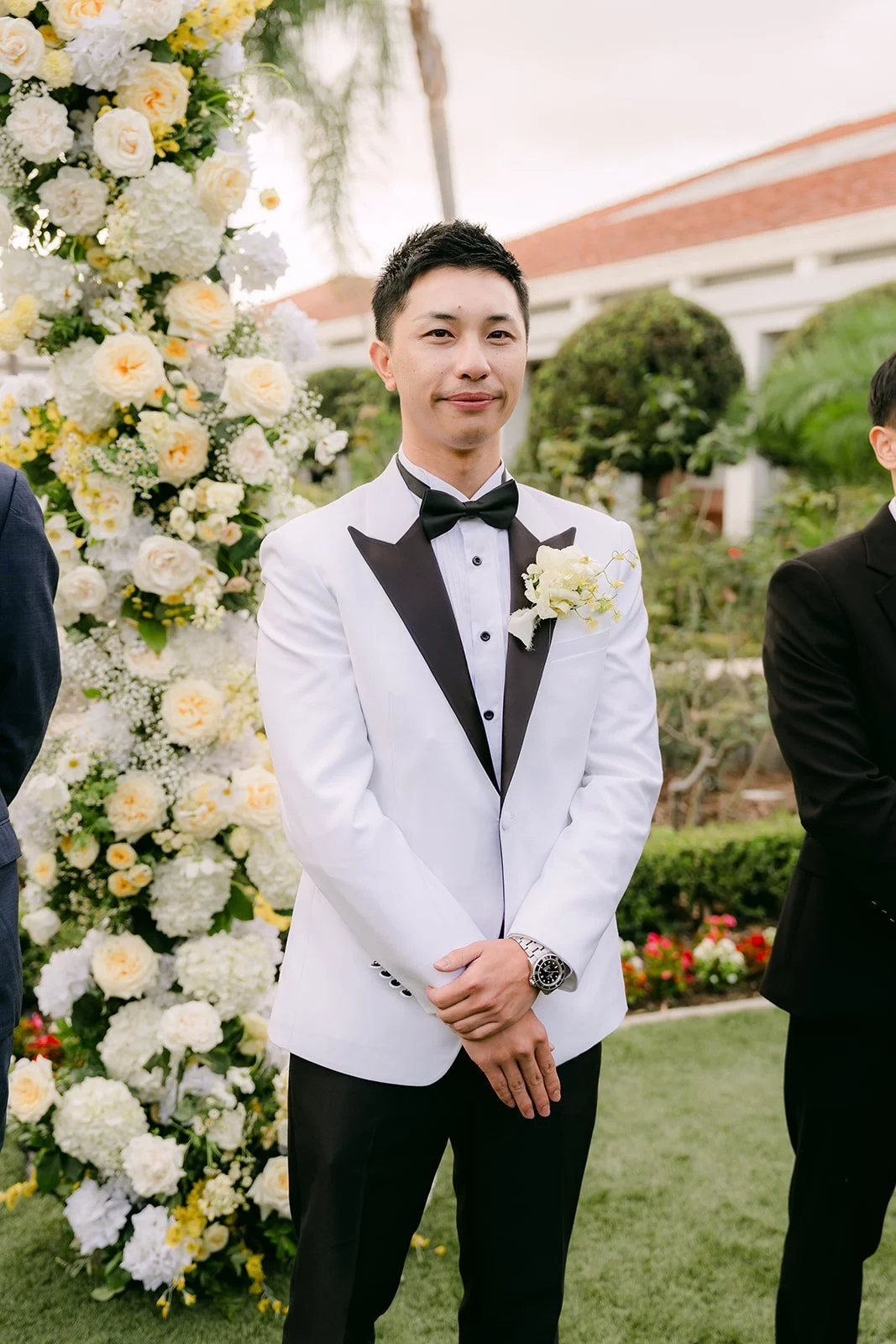 Ryan waiting at the floral altar.