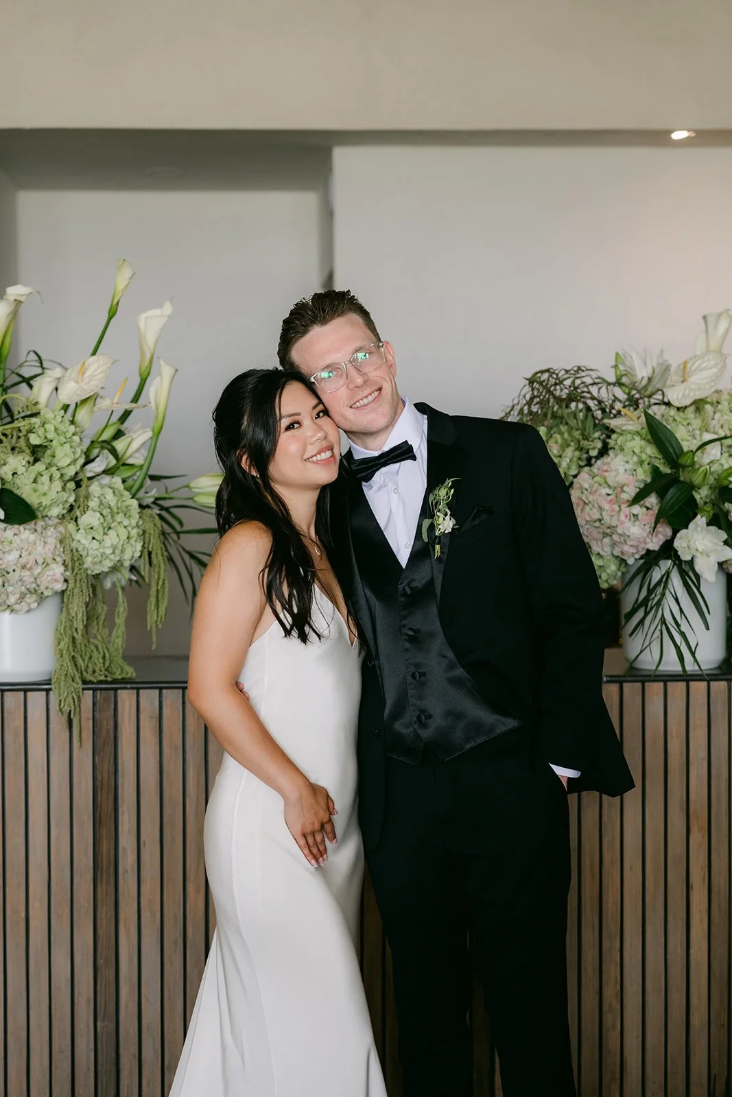 Justine and Matthew smiling together before the ceremony