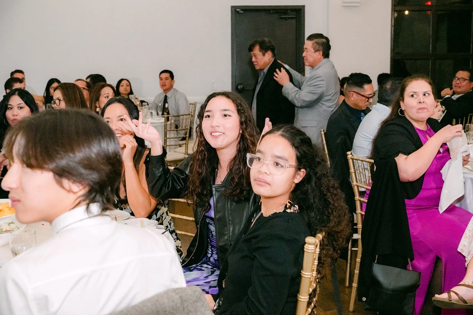 Guests laughing during the reception games