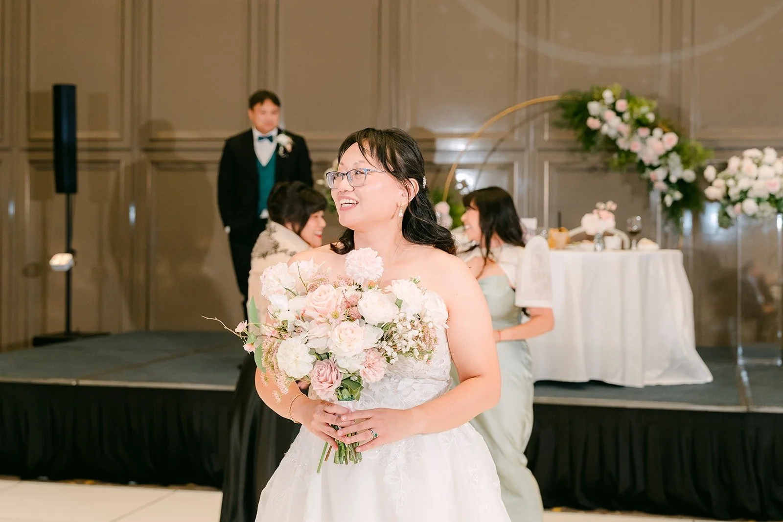 Stella getting ready to toss her bouquet