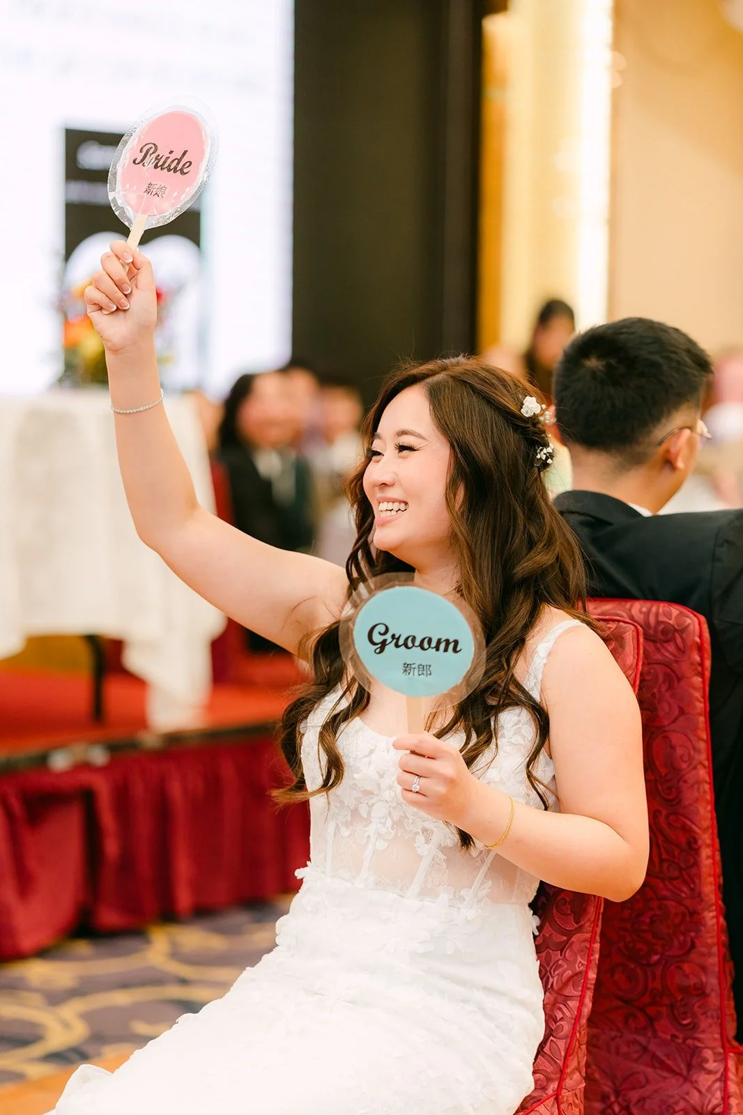 Shayna answers a question with paddles in hand