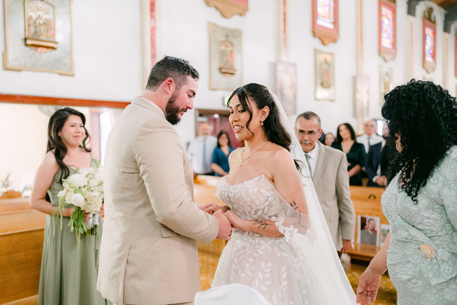 Fernanda and Cody at the altar.