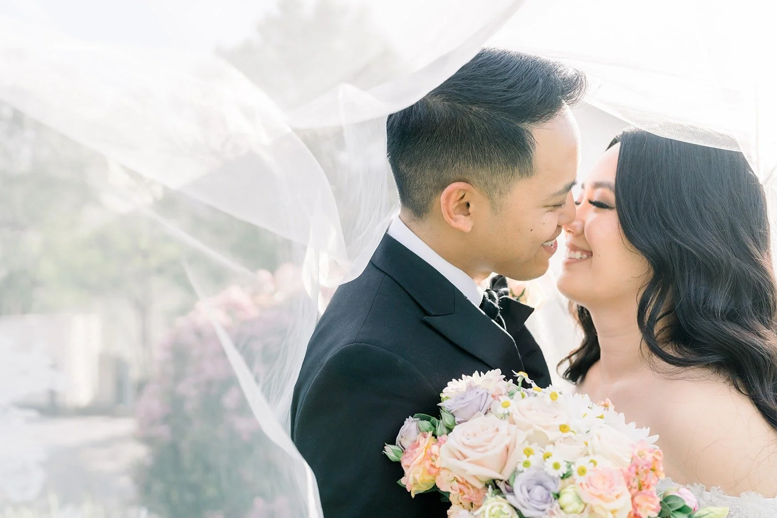 Francesca and Ralph framed by her veil