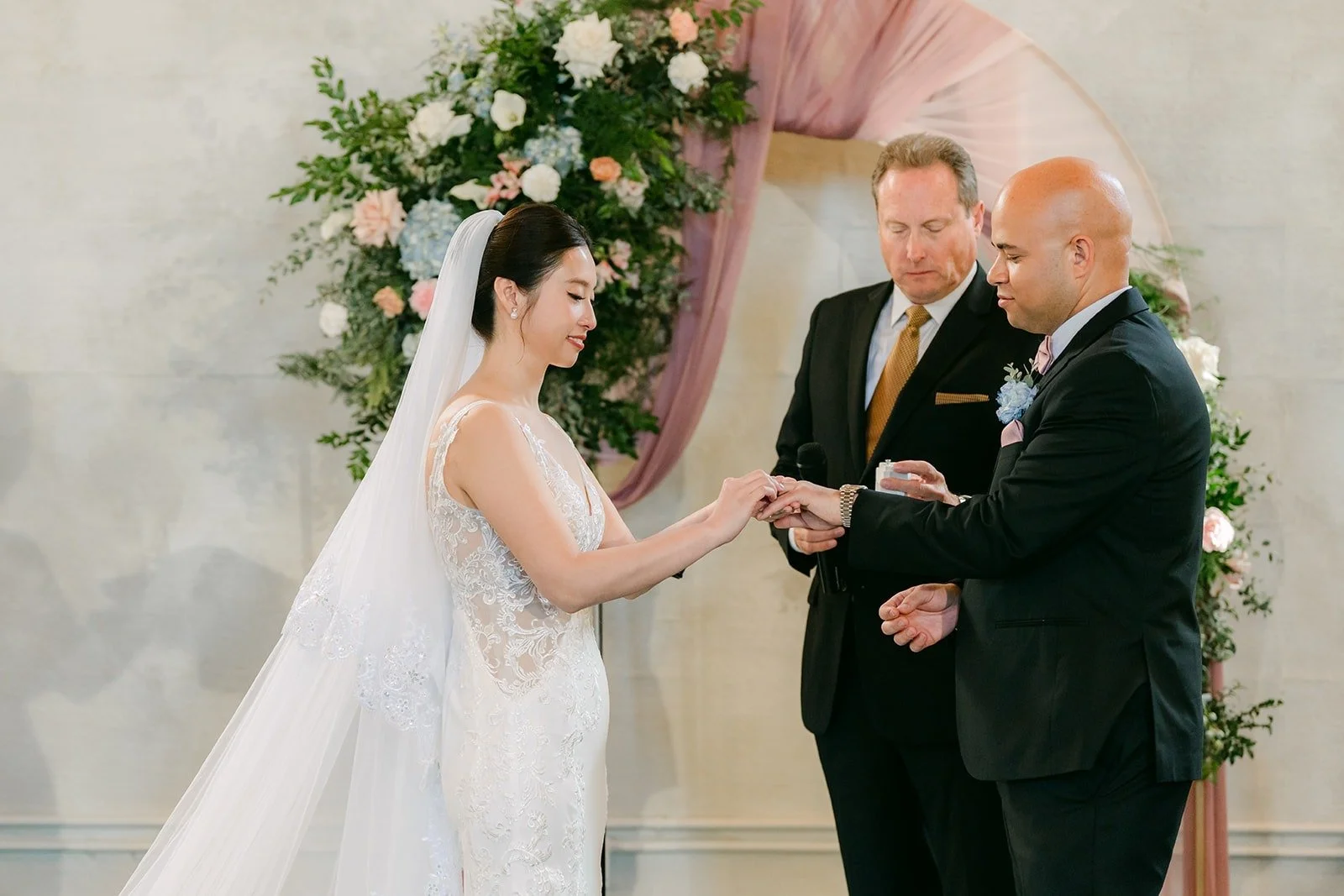 Brandon places the ring on Elisa's finger