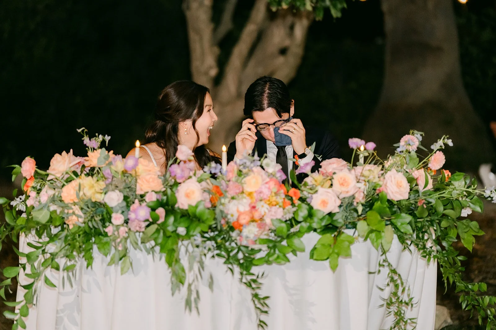 Saya and Leroy at the candlelit sweetheart table
