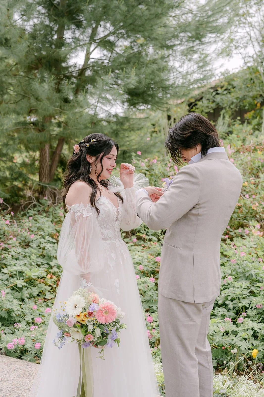 Emotional first look moment on the garden path