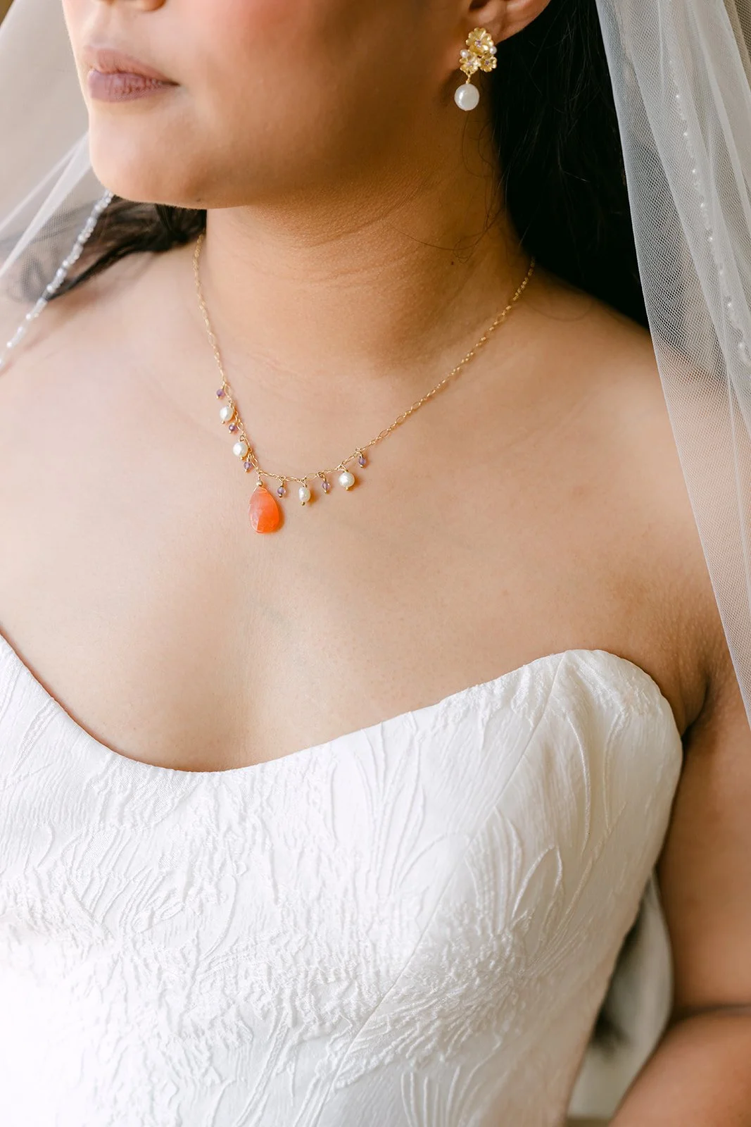 Angela's orange stone necklace and earrings