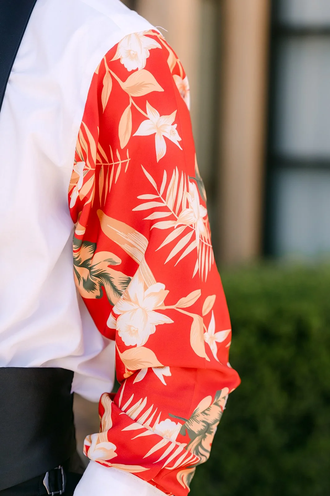 Close up of the red floral lining inside Vincent's jacket