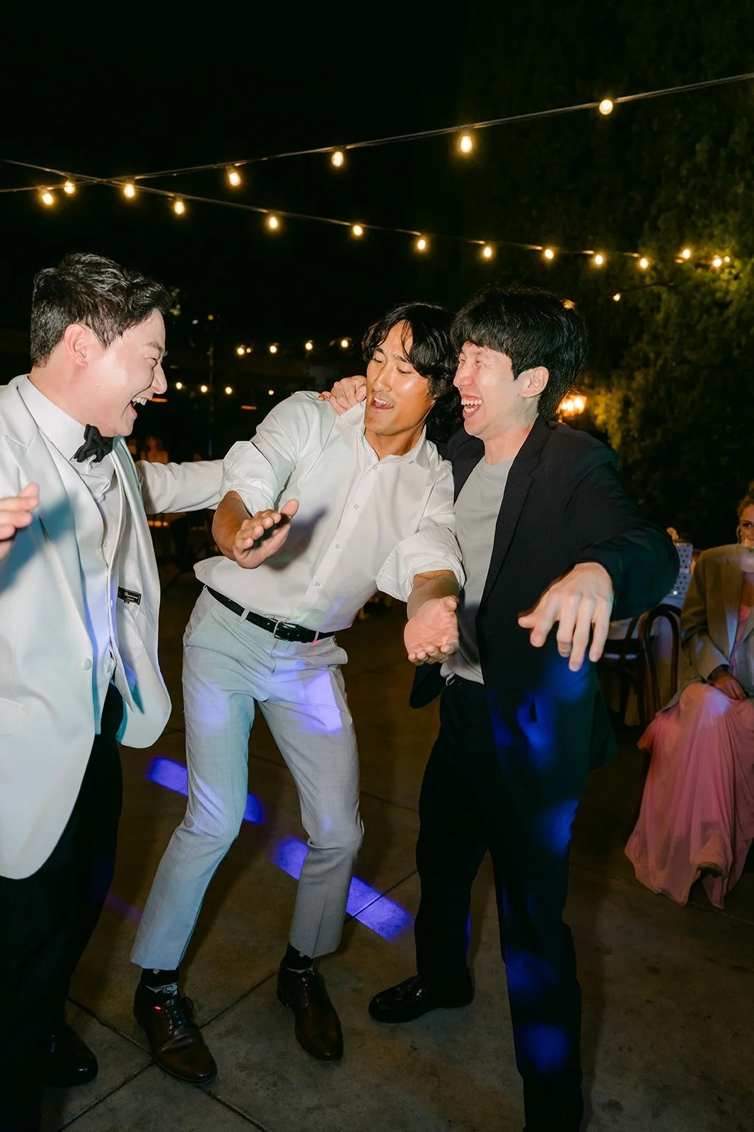 Friends jumping on the dance floor