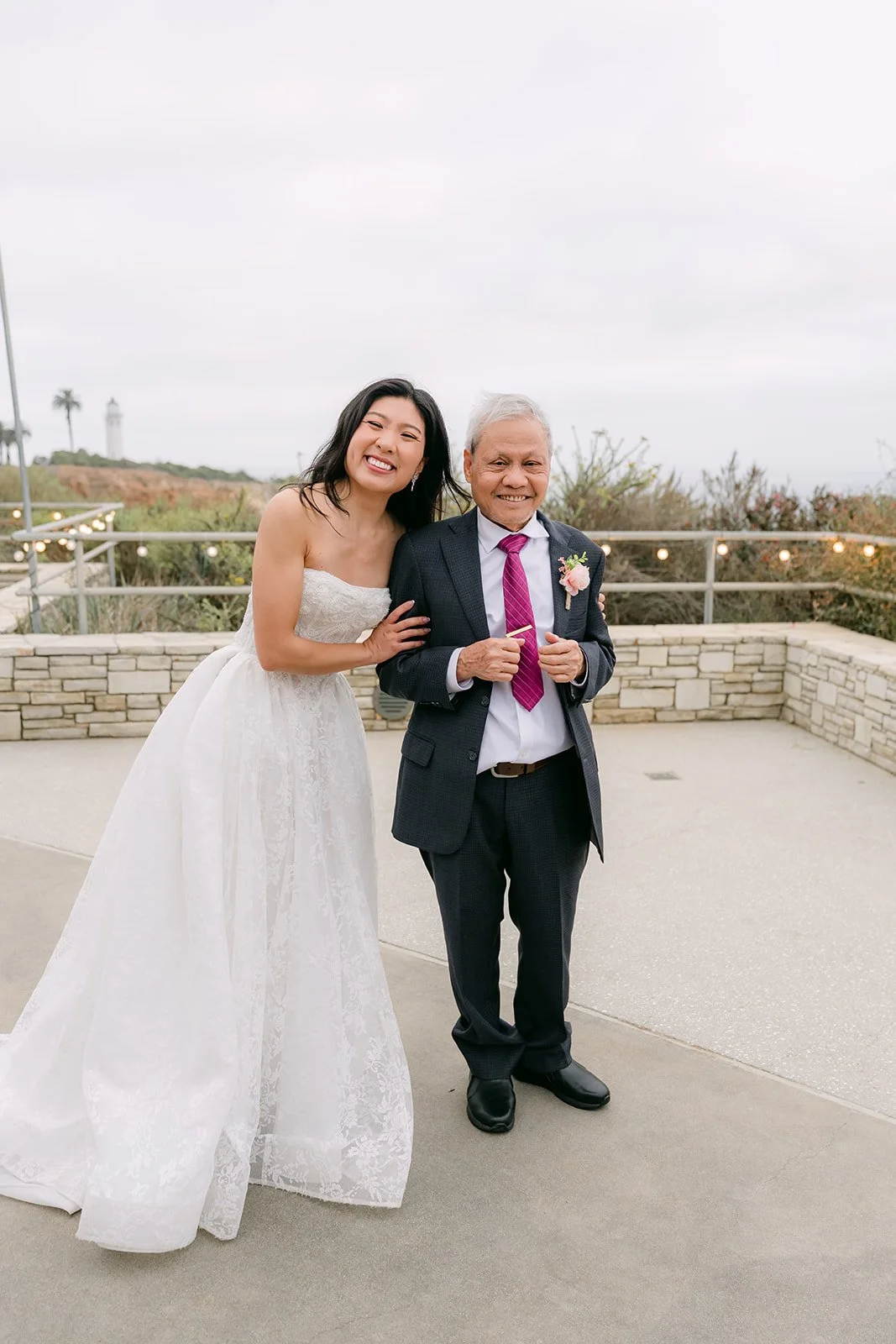 Kim and her dad smiling after their dance