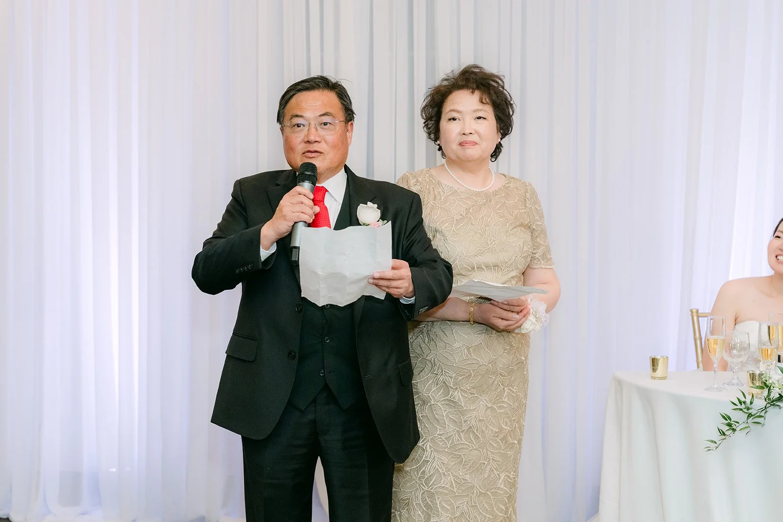 Bride's parents giving a welcome speech
