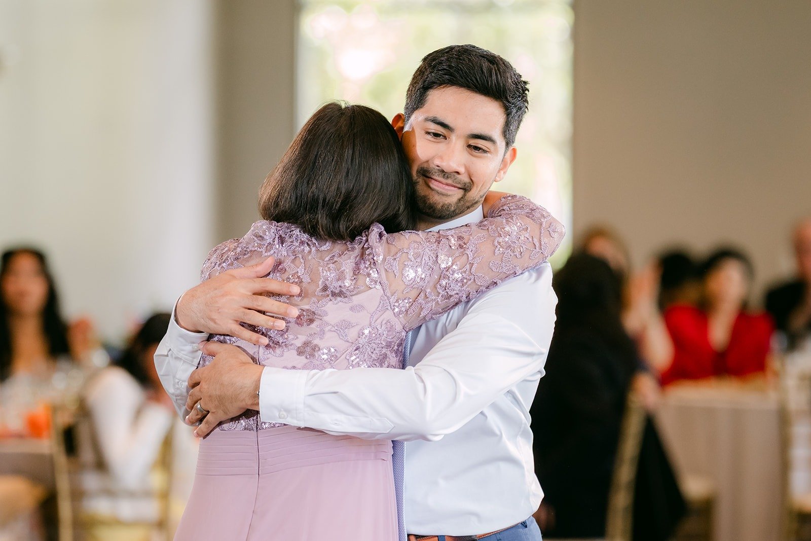 Mark hugging his mom at the end of their dance
