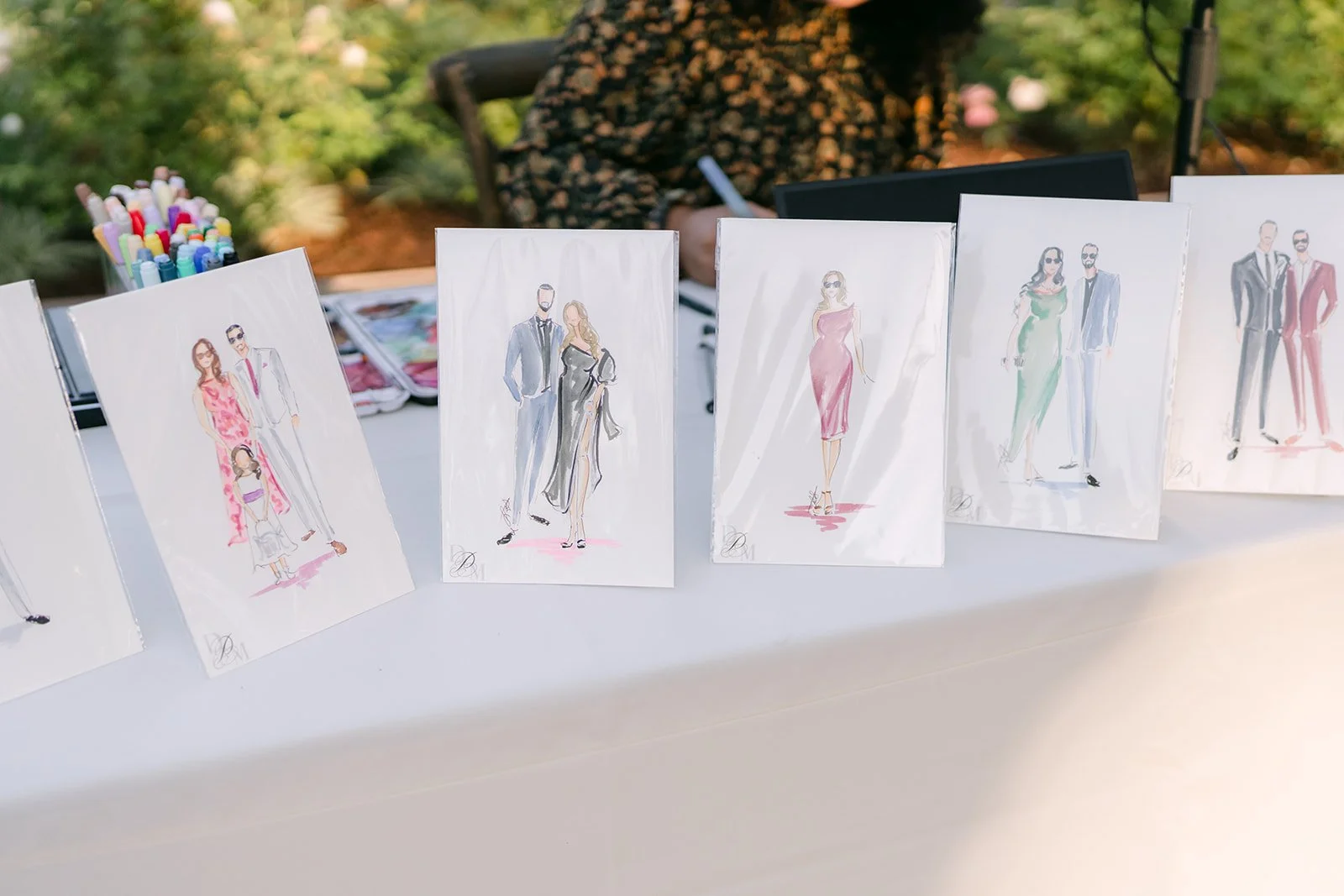 Live watercolor portraits of guests by Curious Pen Creative