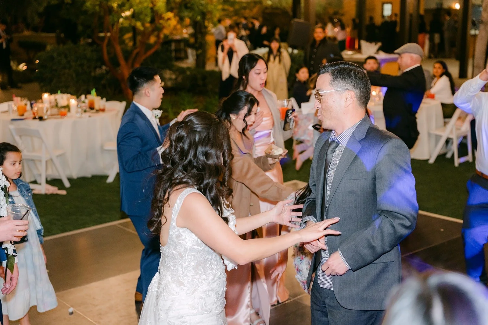 Kelli dancing with a guest at Los Robles Greens