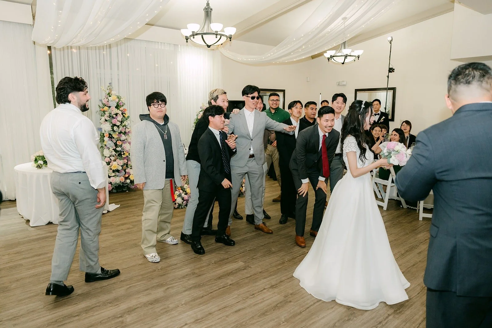 Jeannie on the dance floor with guests during the reception games