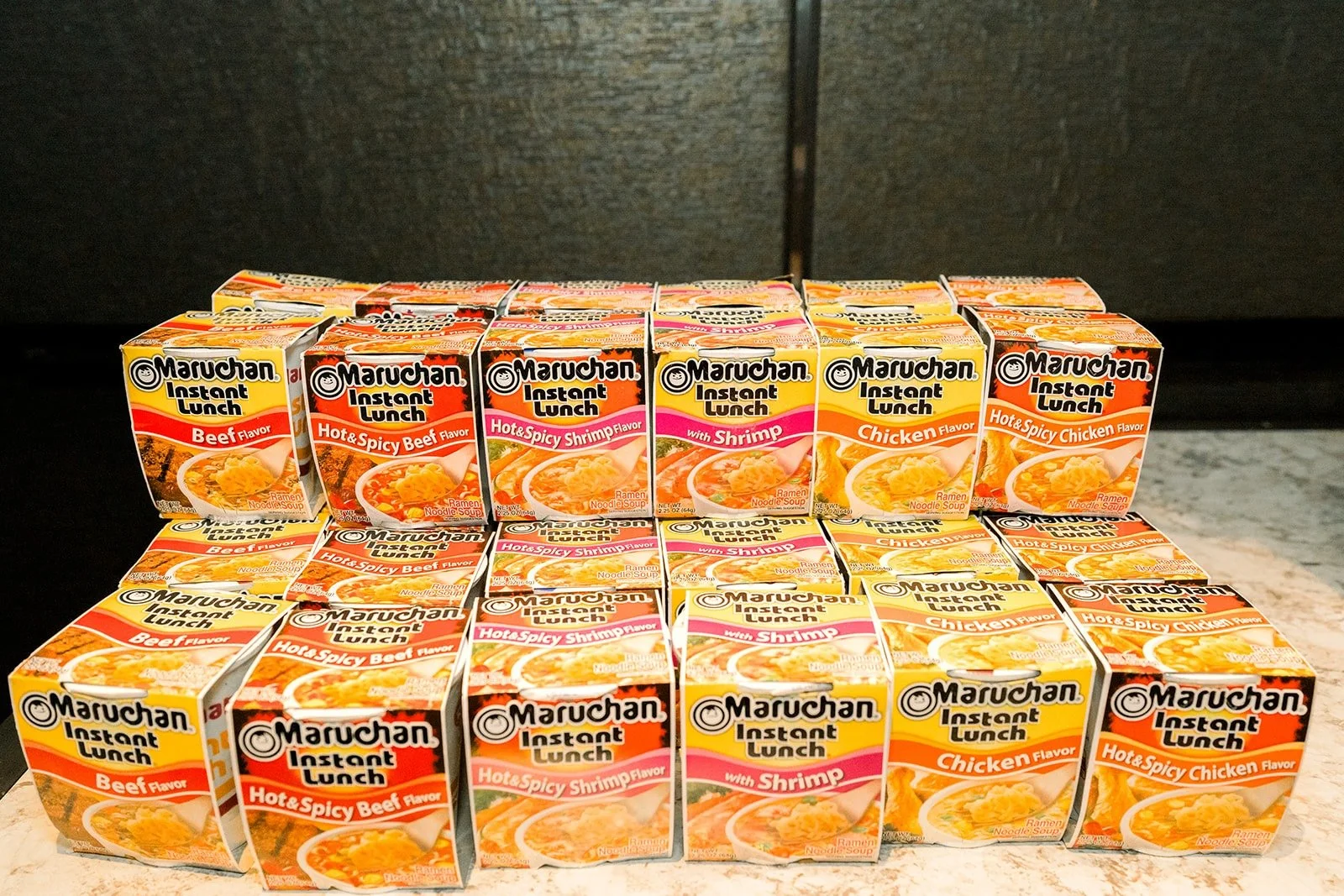 Stacks of instant ramen cups at the ramen bar