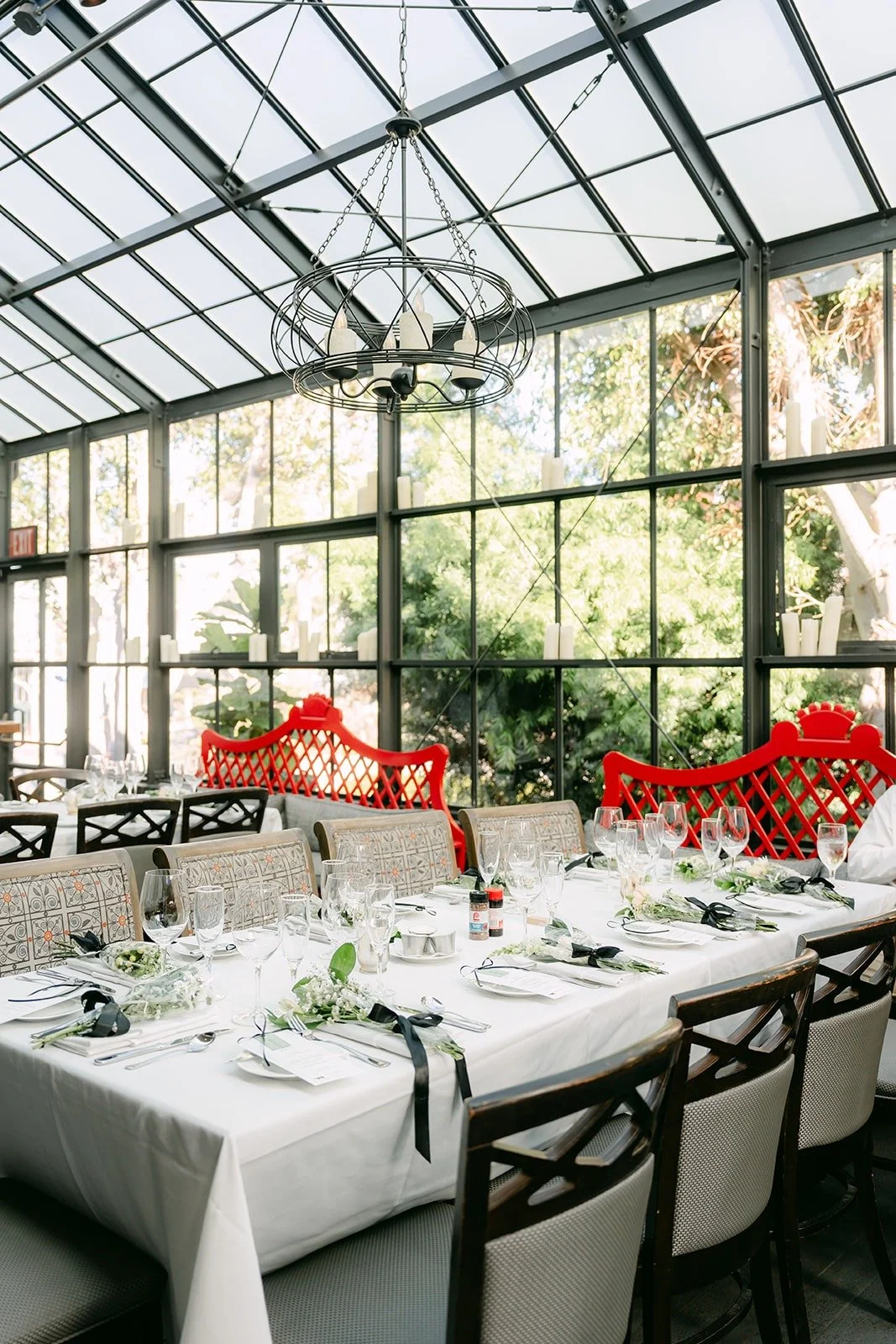 The glass roofed dining room at Five Crowns set for the reception